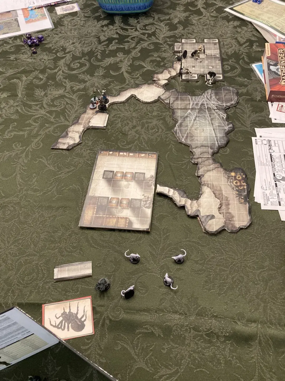 The dungeon begins to spread across the table as the party explores.