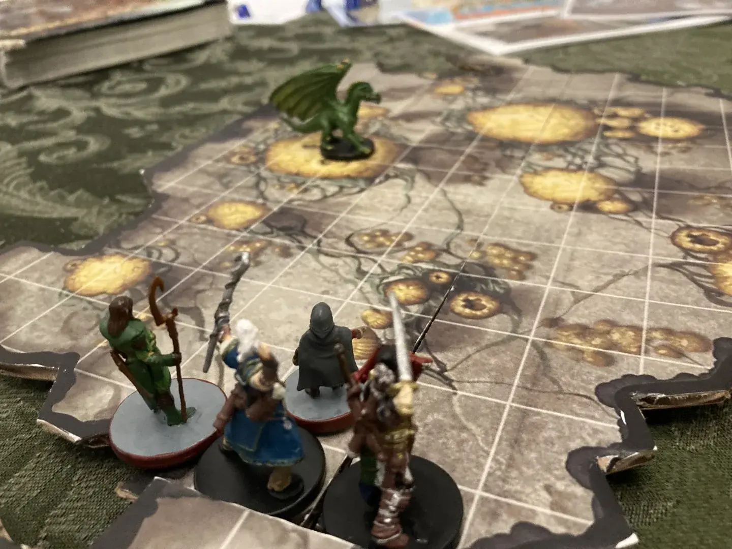 The party confronts the green dragon.